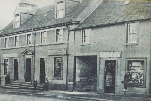 Houses and shops  on Montgomery Street, c 1900